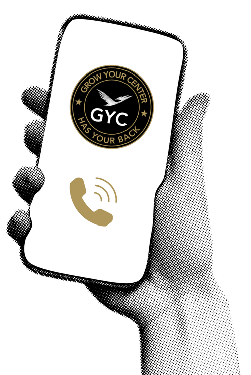 Someone's hand holding a phone with the GYC logo and a gold phone icon on it